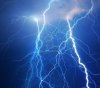 12207713-heavy-clouds-bringing-thunder-lightnings-and-storm.jpg